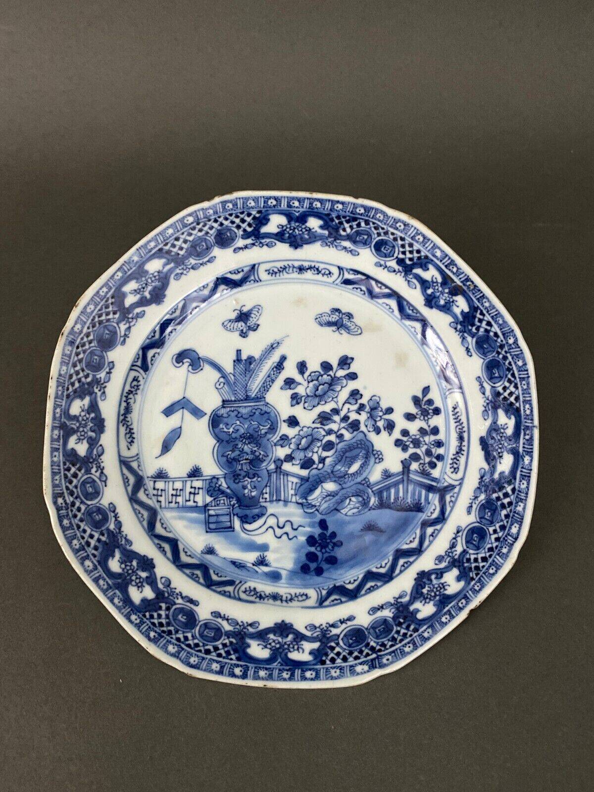 Blue and white China plate decorated with butterflies late 19th century