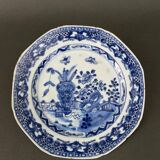 Blue and white China plate decorated with butterflies late 19th century