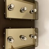 Pair of smoked glass wall lamps, mirrored bottom, Italy 70s