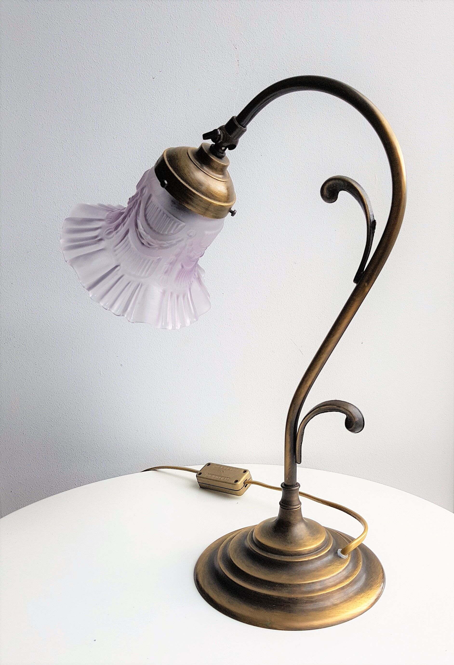 Articulated in brass and frosted glass lamp