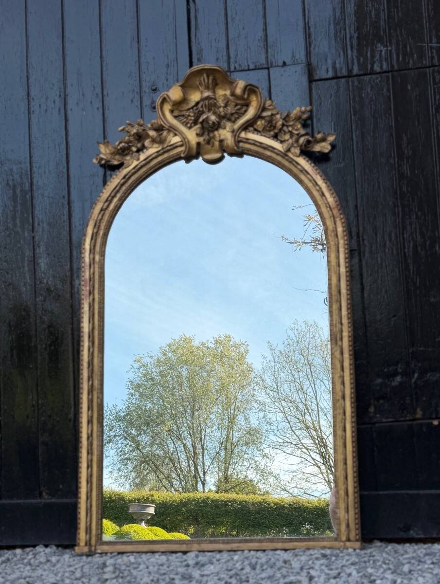 Louis XVI mirror in carved and gilded wood, 18th century