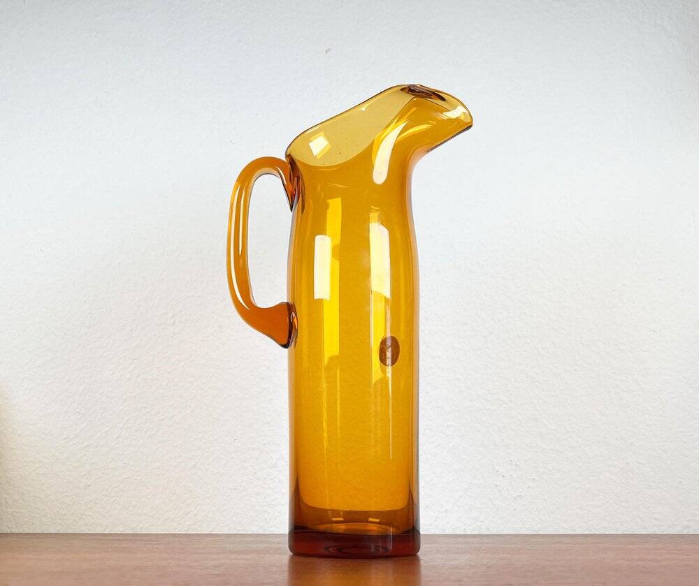 Amber glass carafe from the mid-century German Jagdhaus series and drinking glasses by Wilhelm Braun-Feldweg for Hirschberg, 1960s, set of 7.