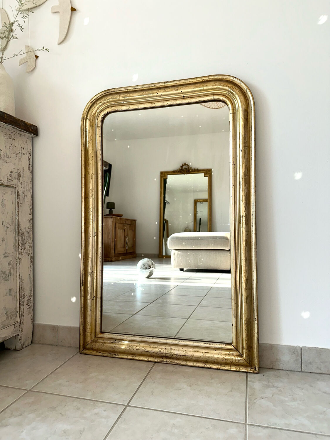 Louis-Philippe antique mirror with silver leaf, 19th century.