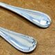 7 Christofle silver-plated oyster forks with Louis crossed ribbons