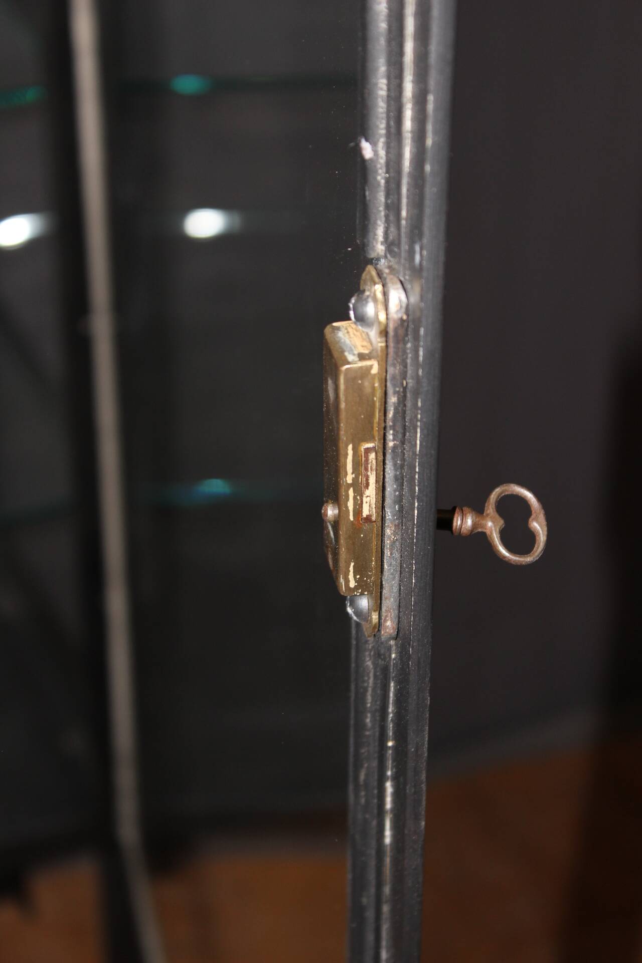 Iron display cabinet with black patina from around 1920