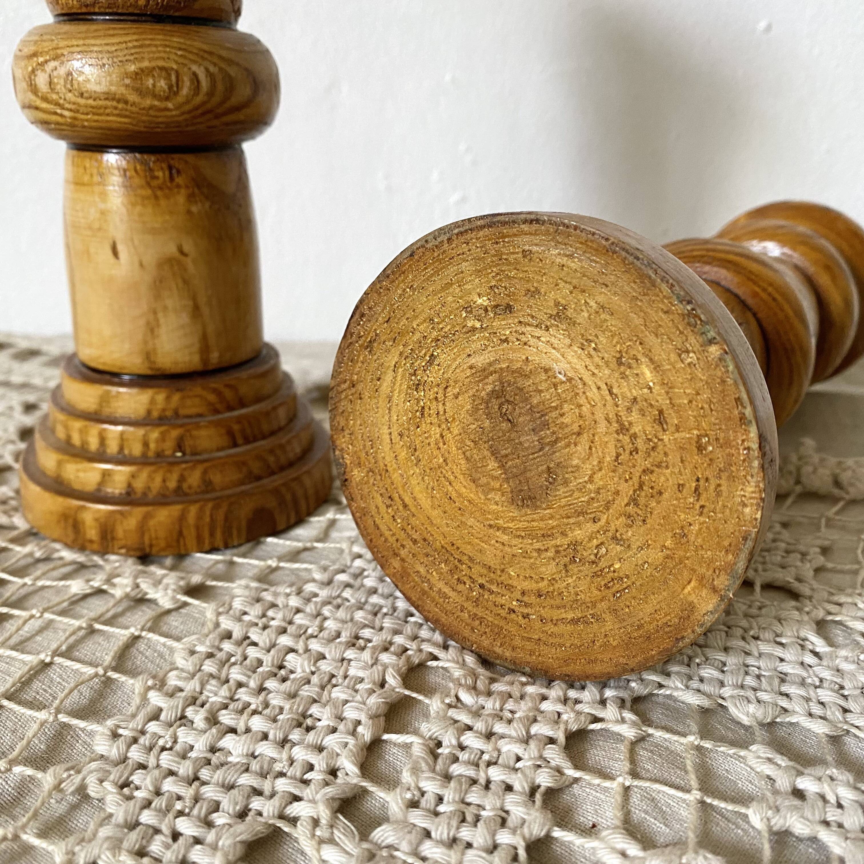 Pair of turned wooden candlesticks