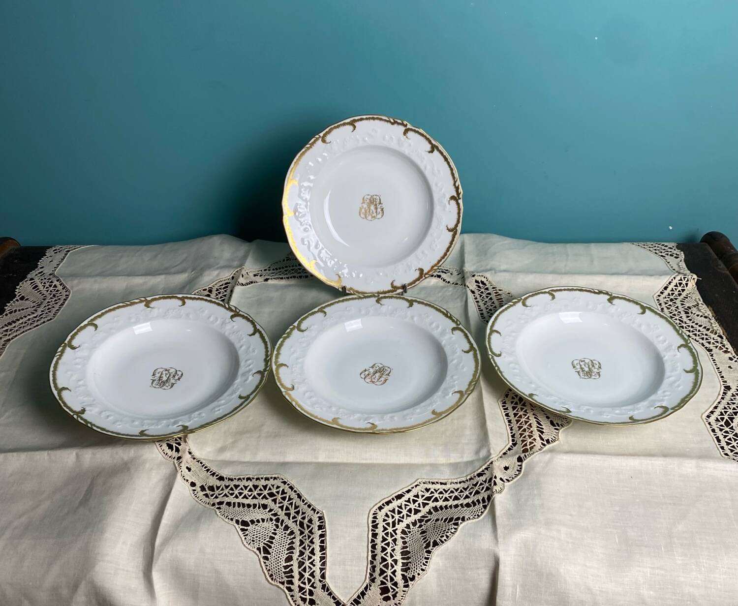 4 deep plates from Limoges with the PJC gold monogram.