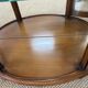 Wooden display case and half-moon mirror