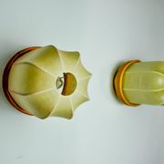 Pair of "cocoon" wall lights, resin and pine, Italy, 1970