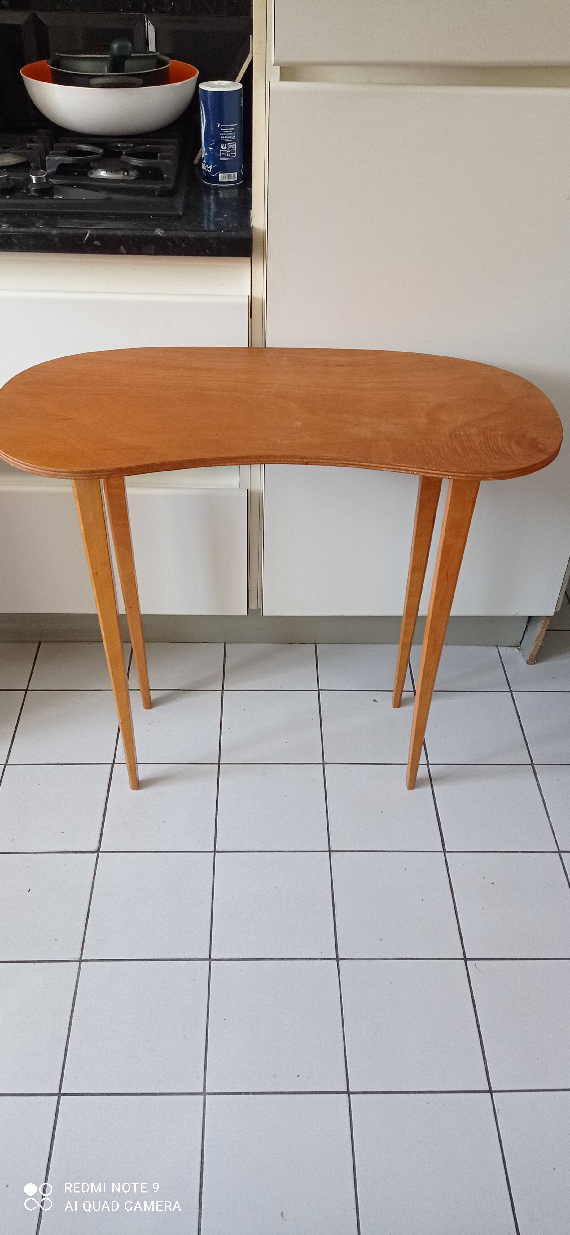 Scandinavian compass leg bean table