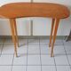 Scandinavian compass leg bean table