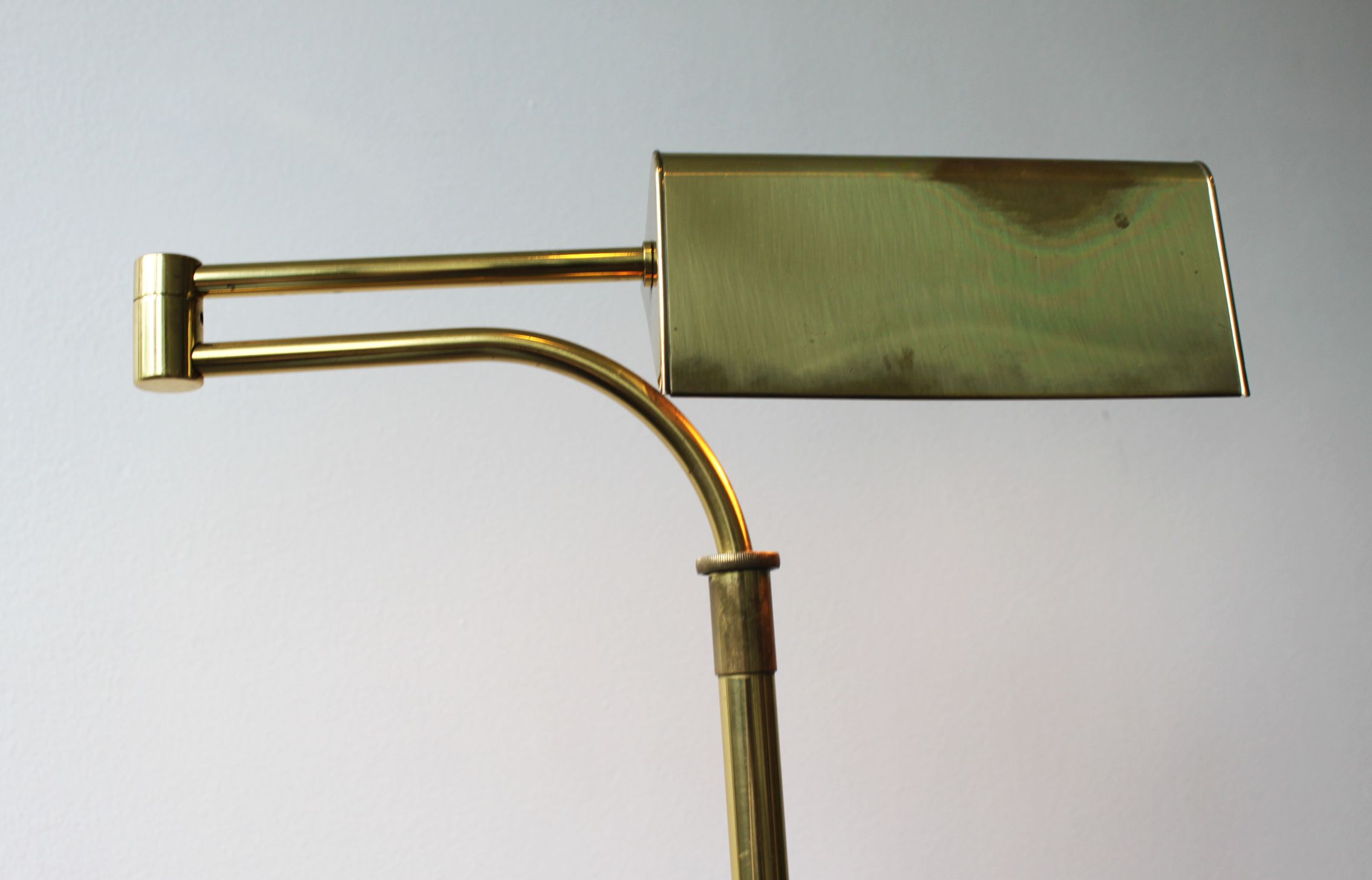 Gilded brass articulated reading light, France, 70's.