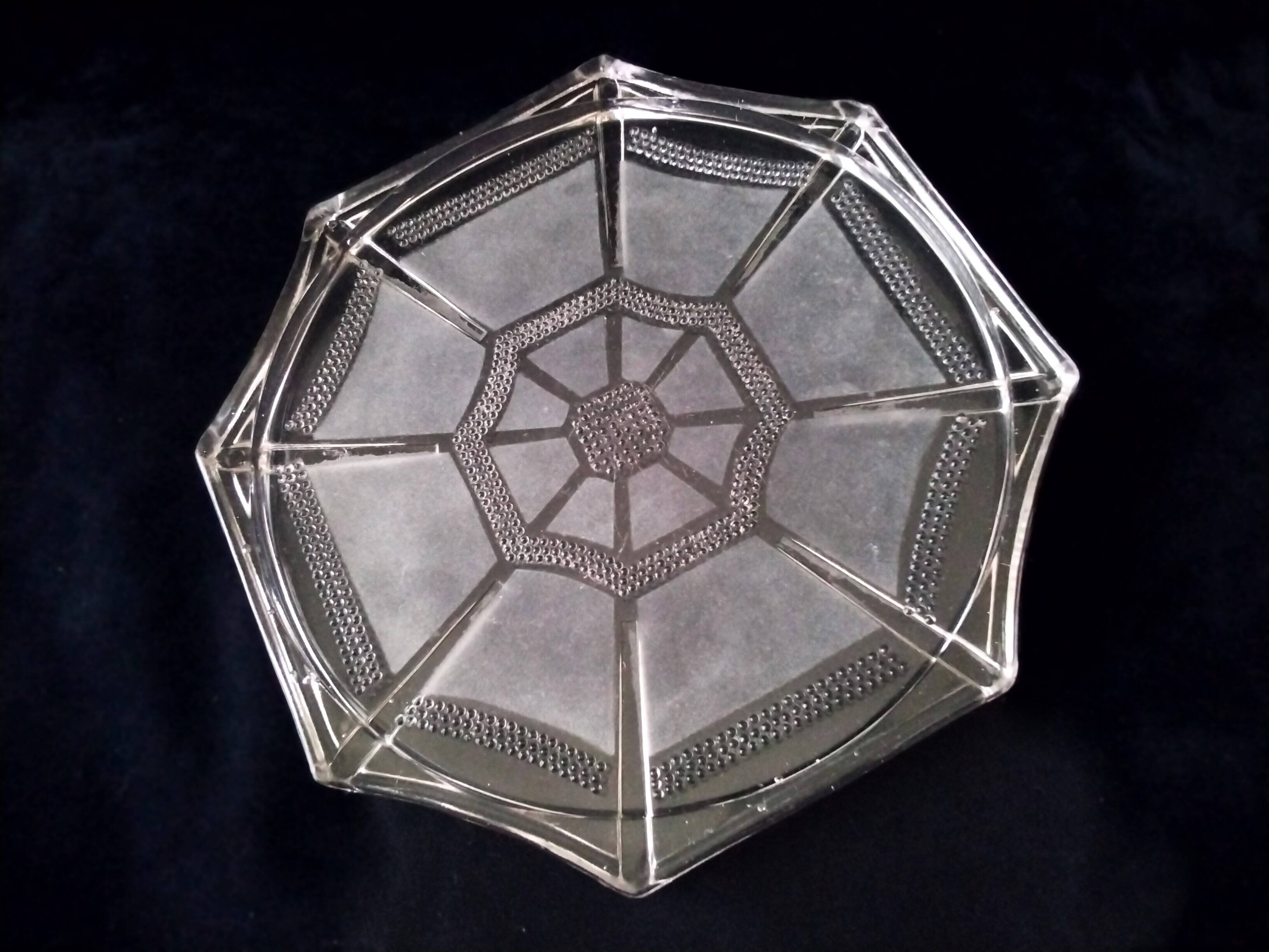 Art deco style molded pressed glass trivet