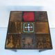 Old black metal and majolica tiles table