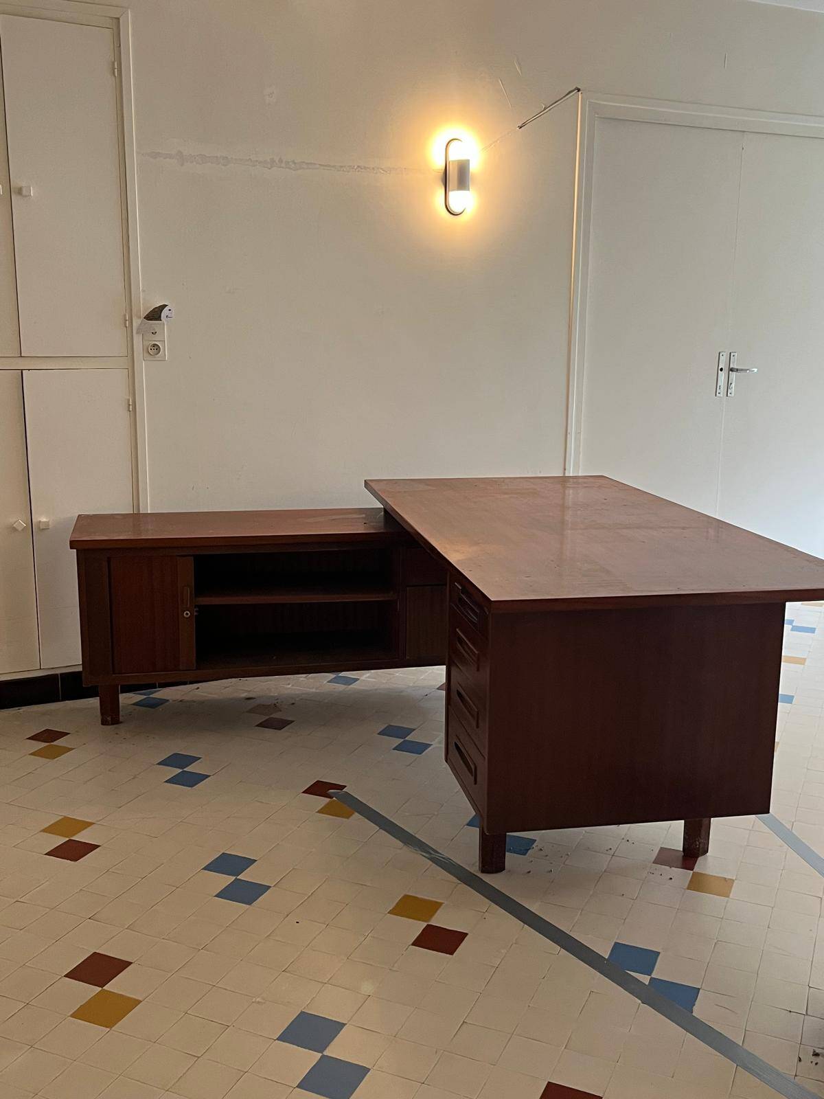 Vintage mahogany executive desk with bar.