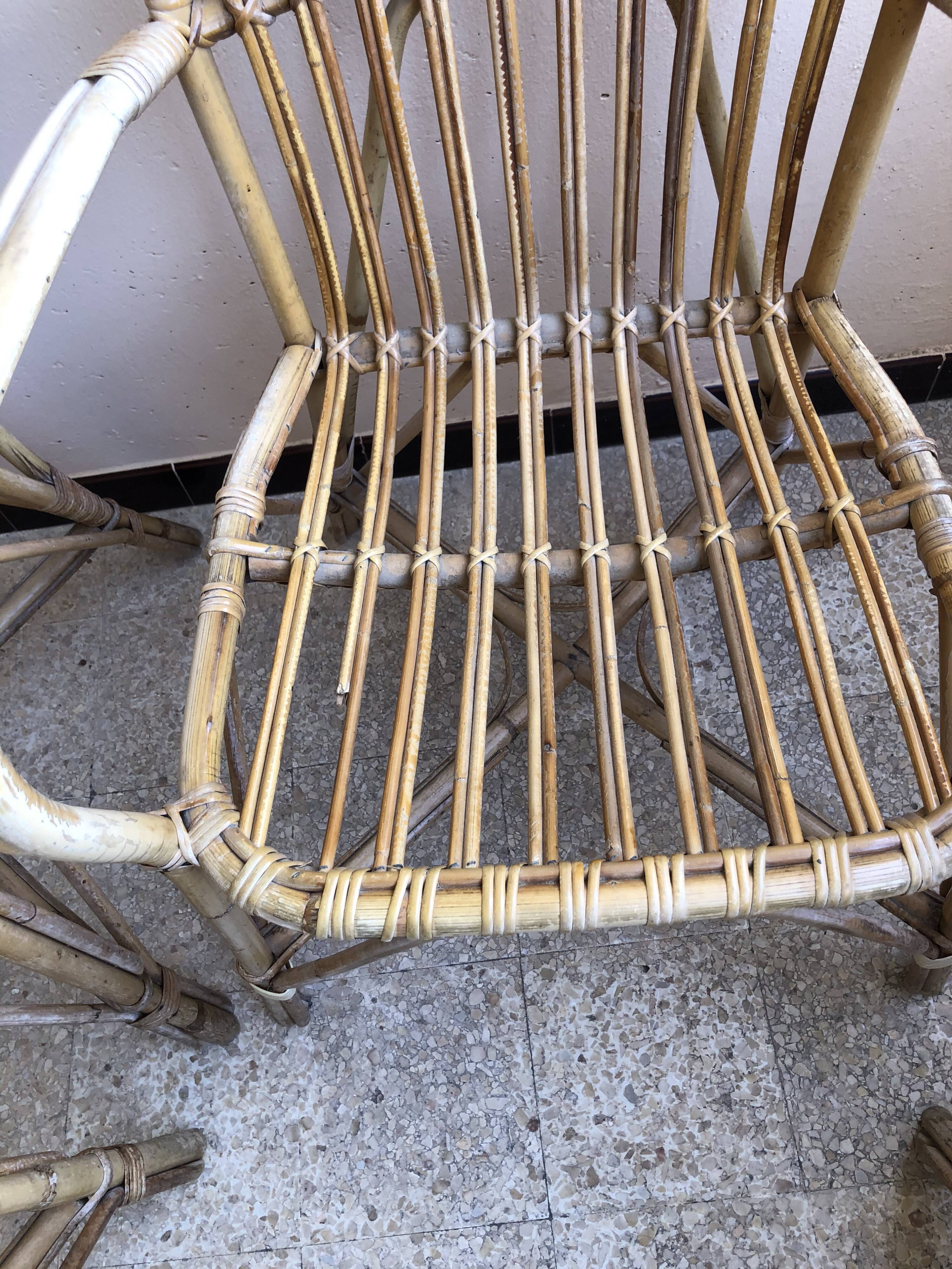 Series of 4 vintage rattan armchairs