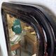 Antique Louis Philippe mirror with a patinated black frame.