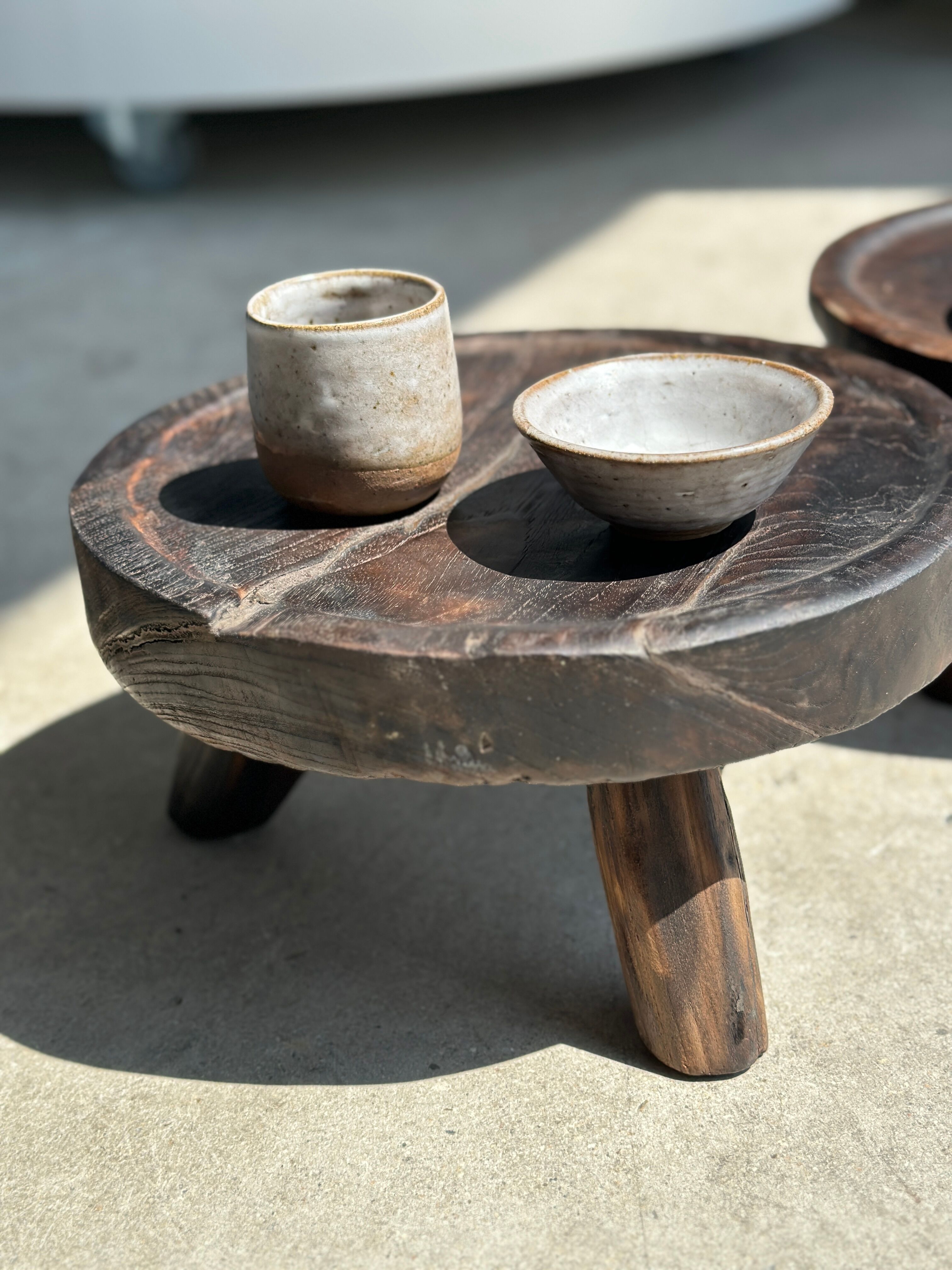 Small tripod stool low in dark brown upcycled teak