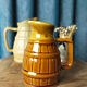 Two pitchers and a small original king beer mug
