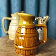 Two pitchers and a small original king beer mug
