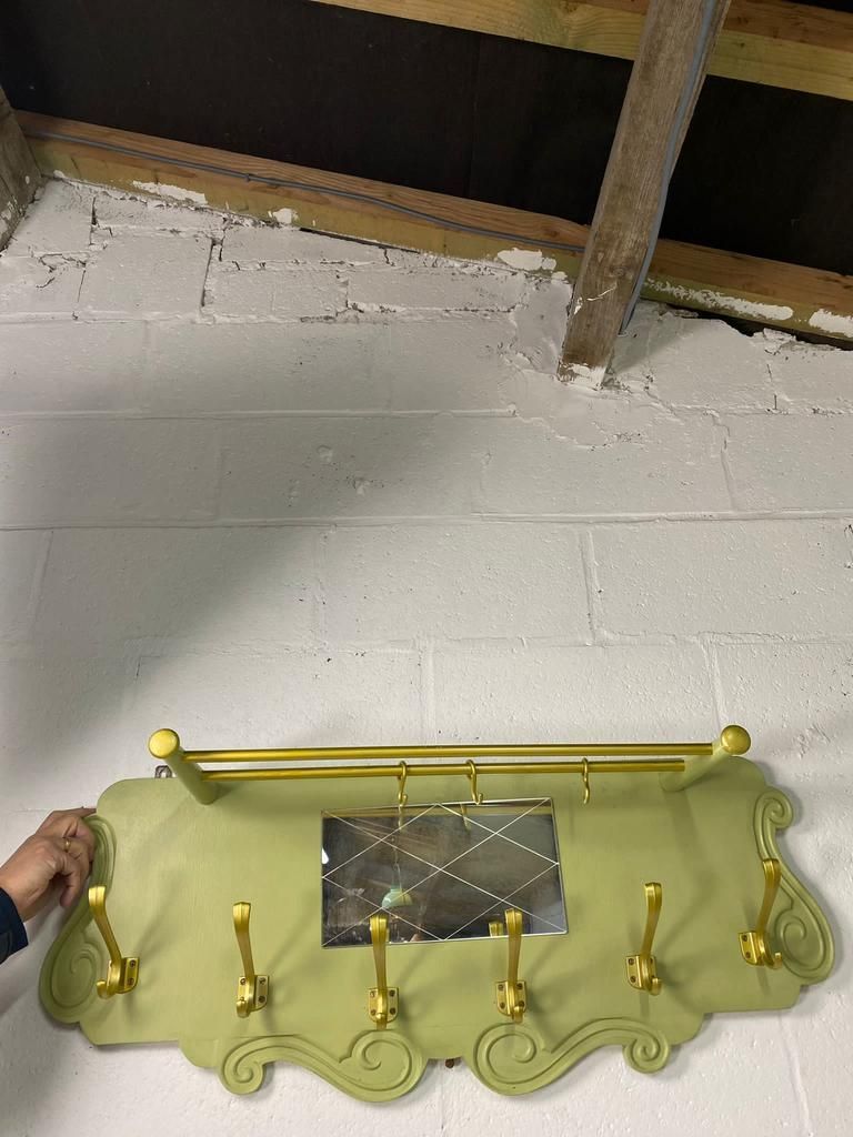 Vintage olive green wall coat rack with mirror