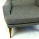 Monumental grey wingback armchair from mid-century Austria by Oswald Haerdtl.