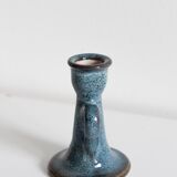 Antique candle holder in glazed ceramic