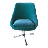 Green velvet armchair