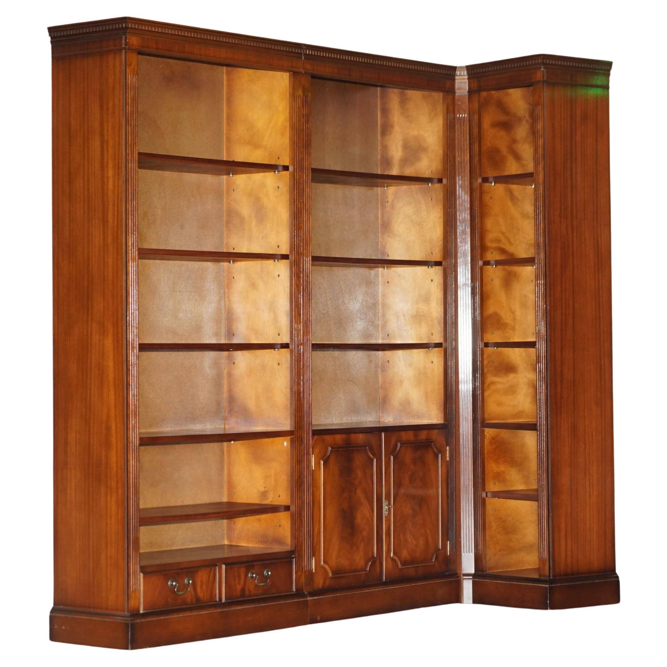 Corner library made of flamed hardwood, in 3 parts.