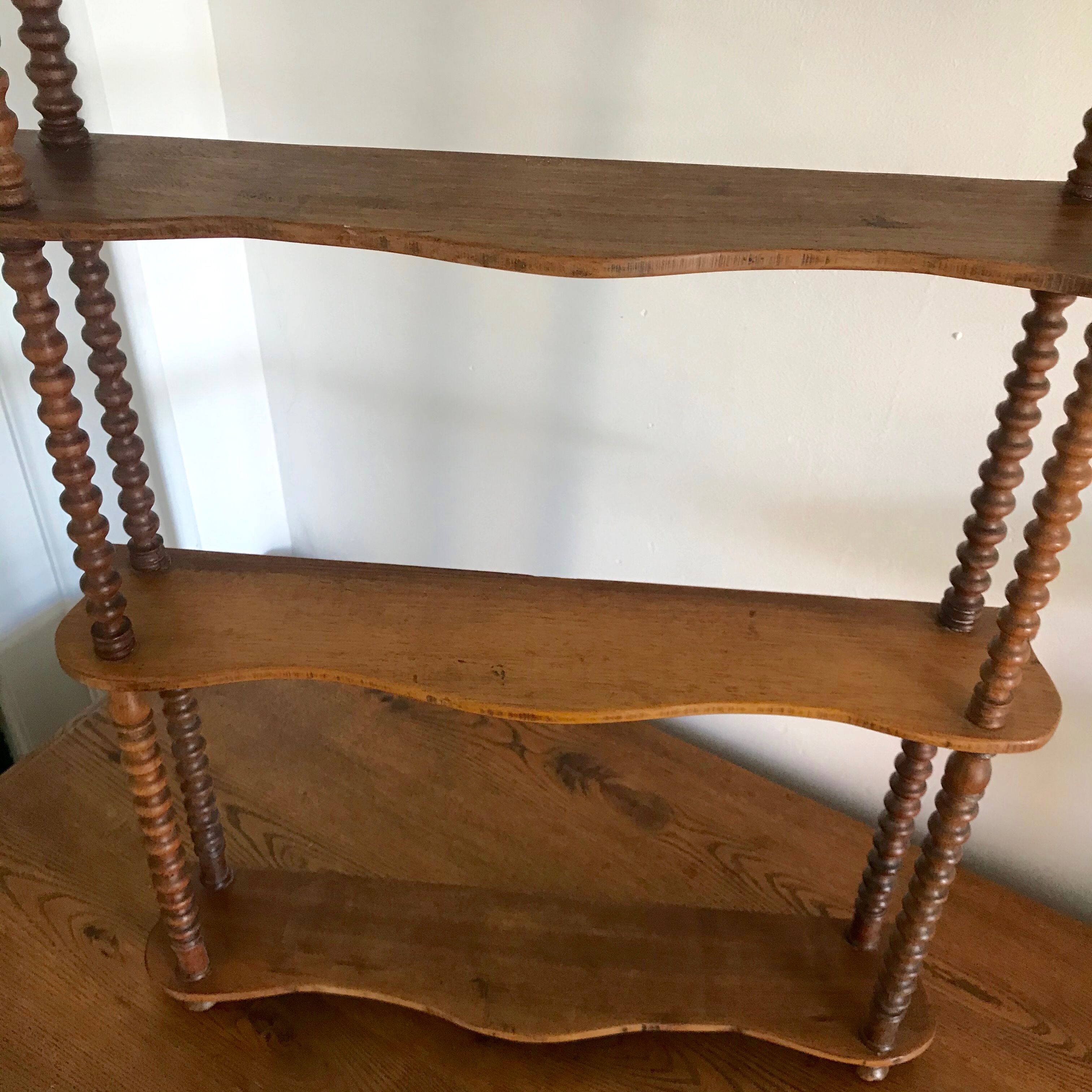 Turned wooden shelf