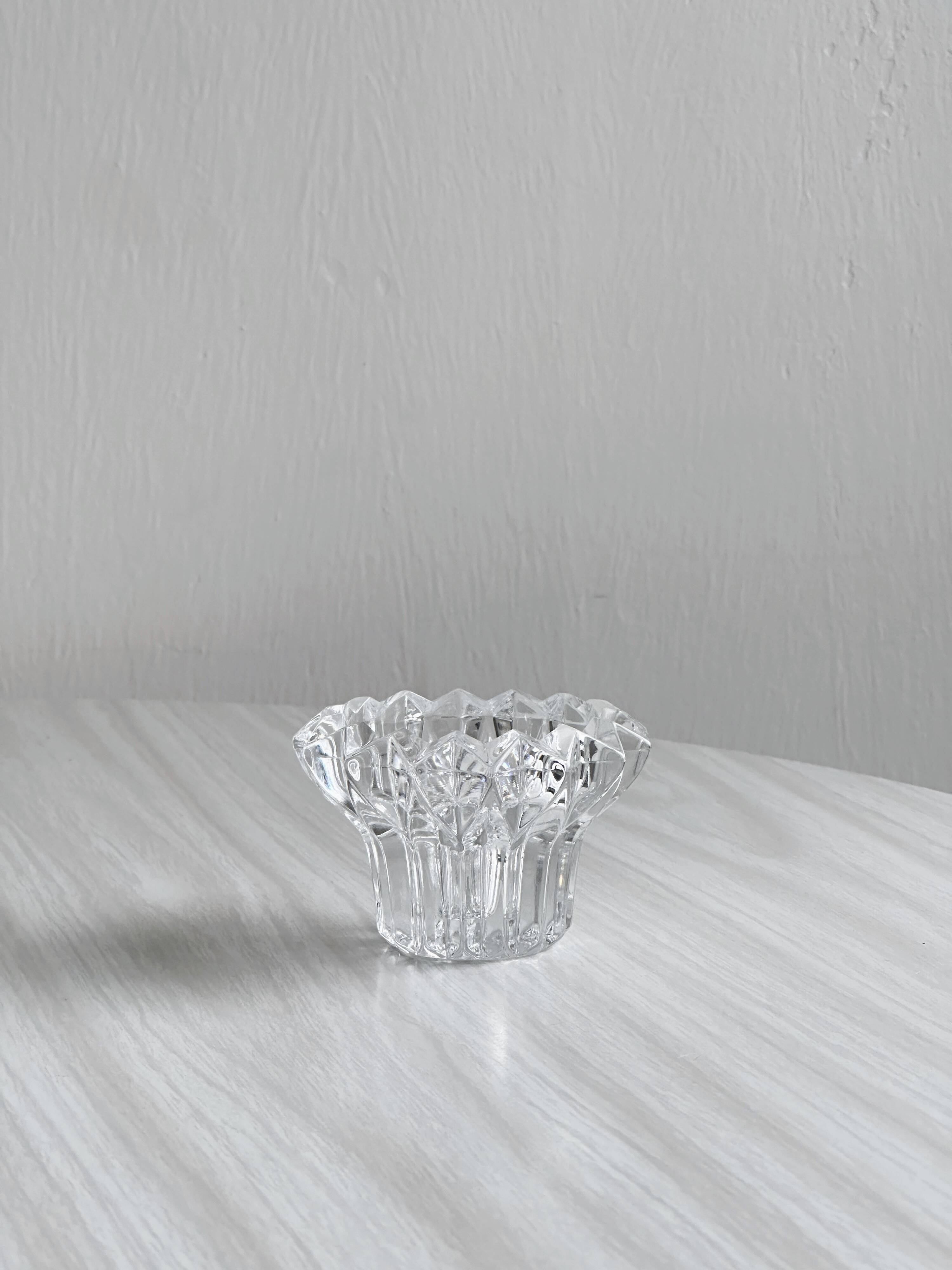 Elegant pair of faceted cut crystal candlesticks