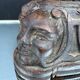 Sculpted wooden lamp with faces, antique.