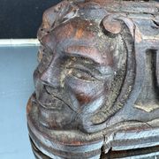 Sculpted wooden lamp with faces, antique.