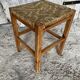 Tabouret ancien en bois sculpté et paille