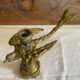 Bronze bird candle holder