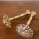2 golden brass hooks with flower curtain tiebacks