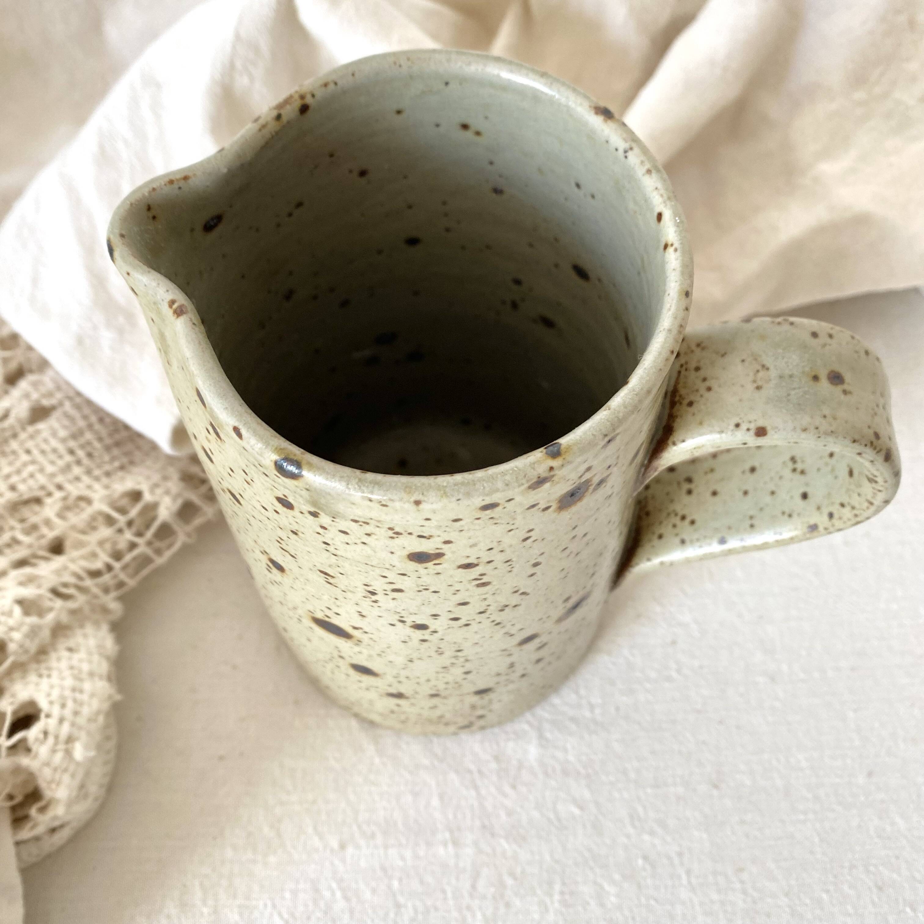Pyreted stoneware pitcher