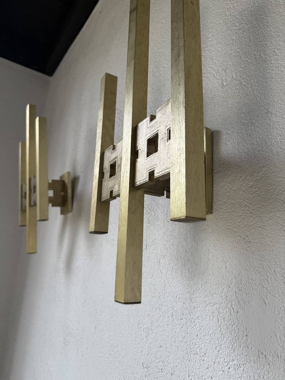 Pair of Regency brass wall lights in Italy
