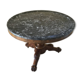 Wooden gueridon with marble, lion paw legs.
