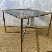 Side table with oxidised metal mirror top on a brass frame, France, 1960s.