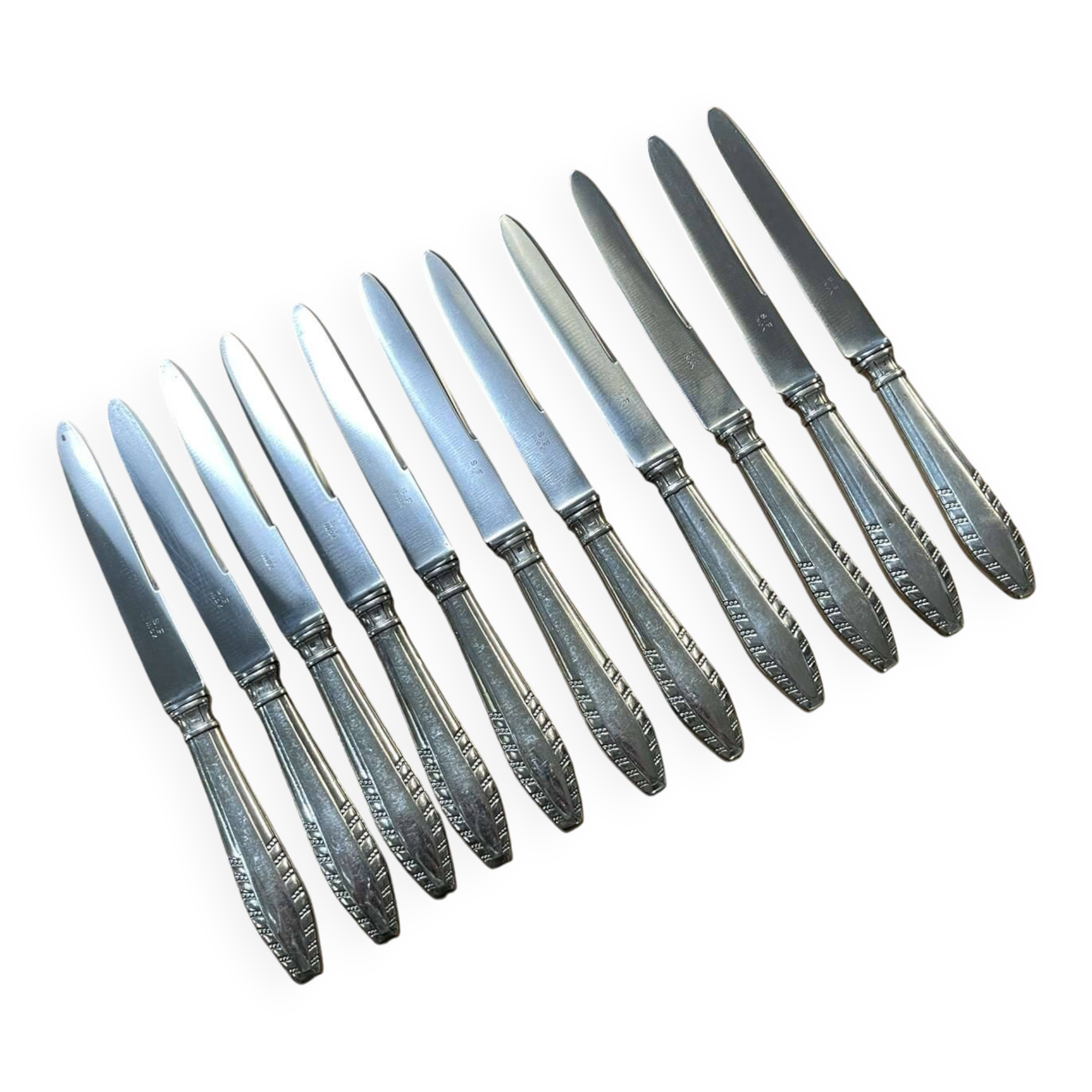 Set of 11 dessert knives in silver metal with stainless steel blades