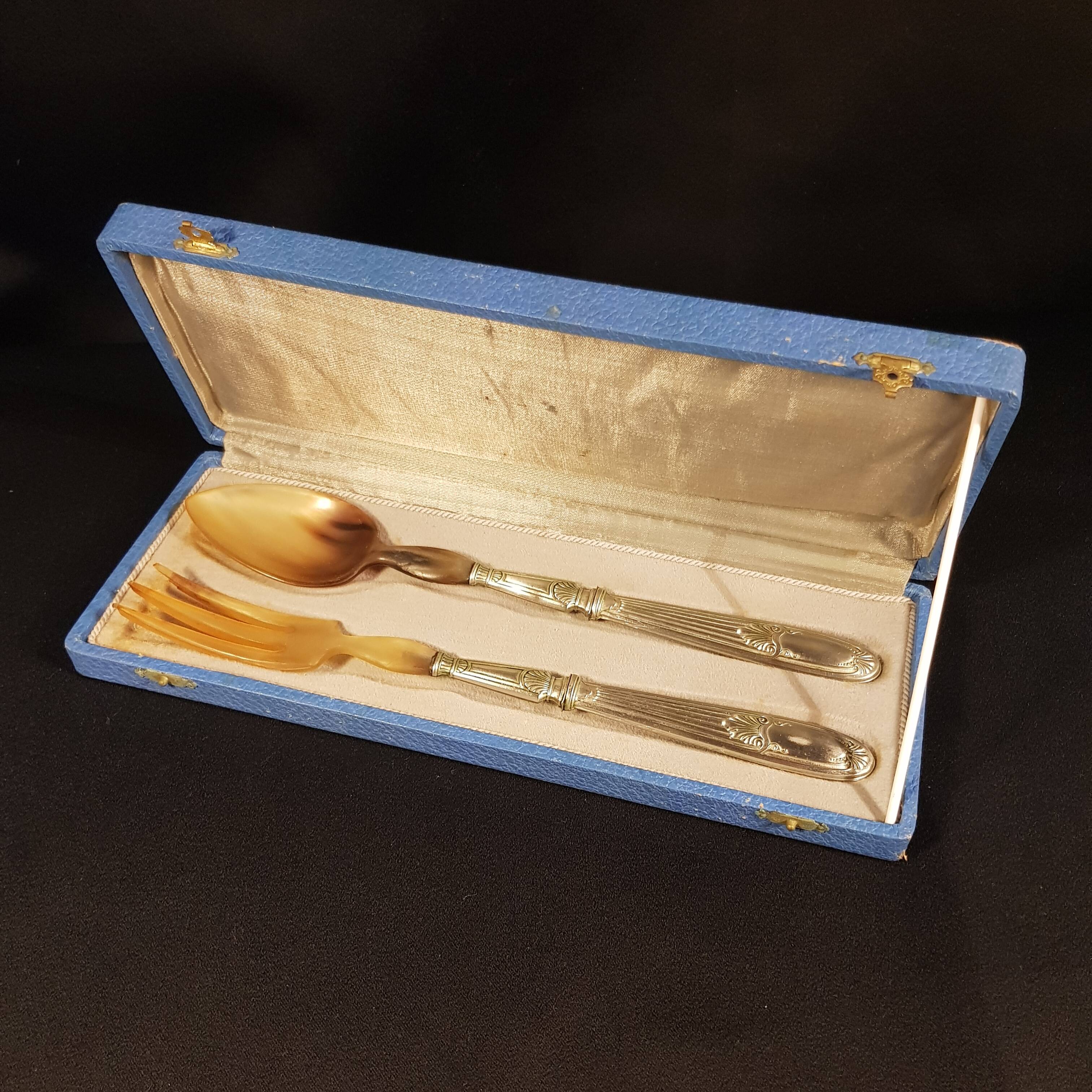 Old salad servers in their case