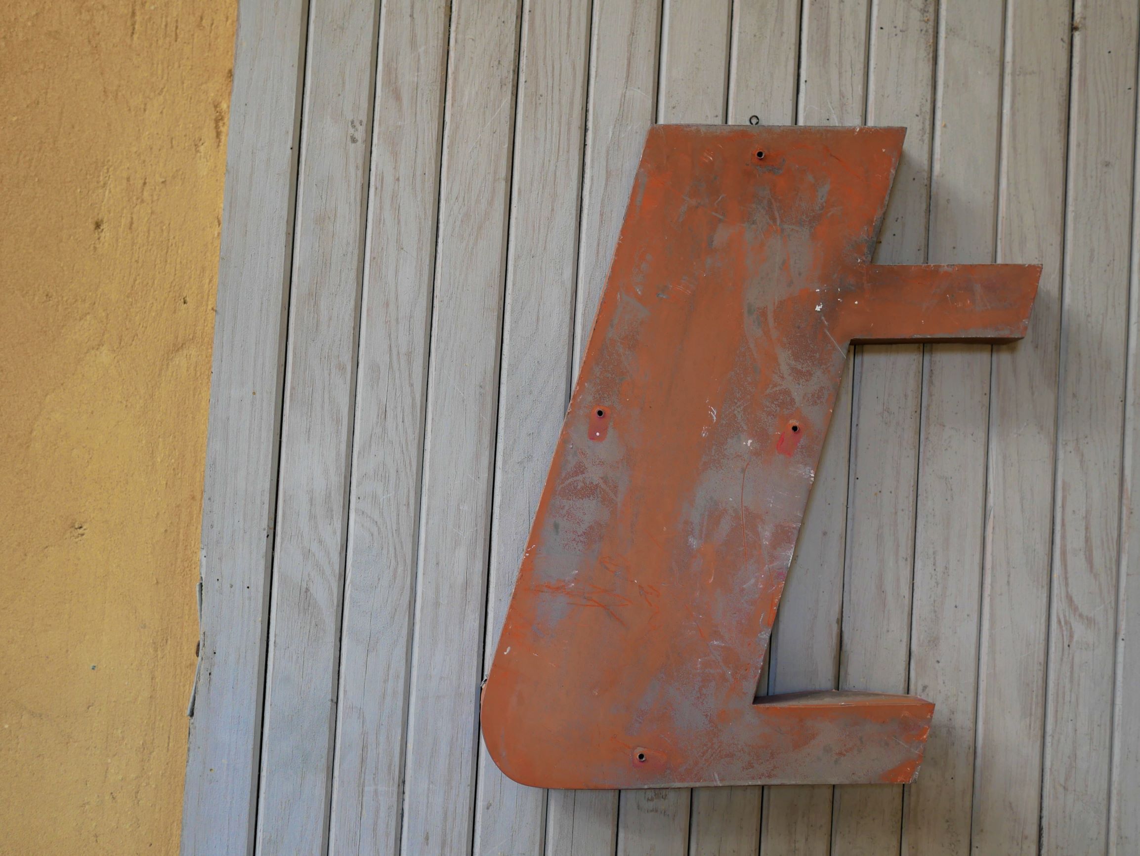 Letter to sign vintage metal "T".