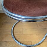 Chrome aluminum chair and brown cotton