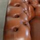 Very spacious 2-seater Chesterfield sofa in cow leather in a English look