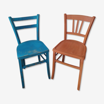 Pair of bistro chairs in patinated wood