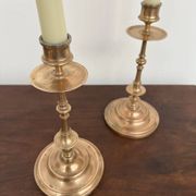 Pair of antique turned rose brass candlesticks (24 cm)