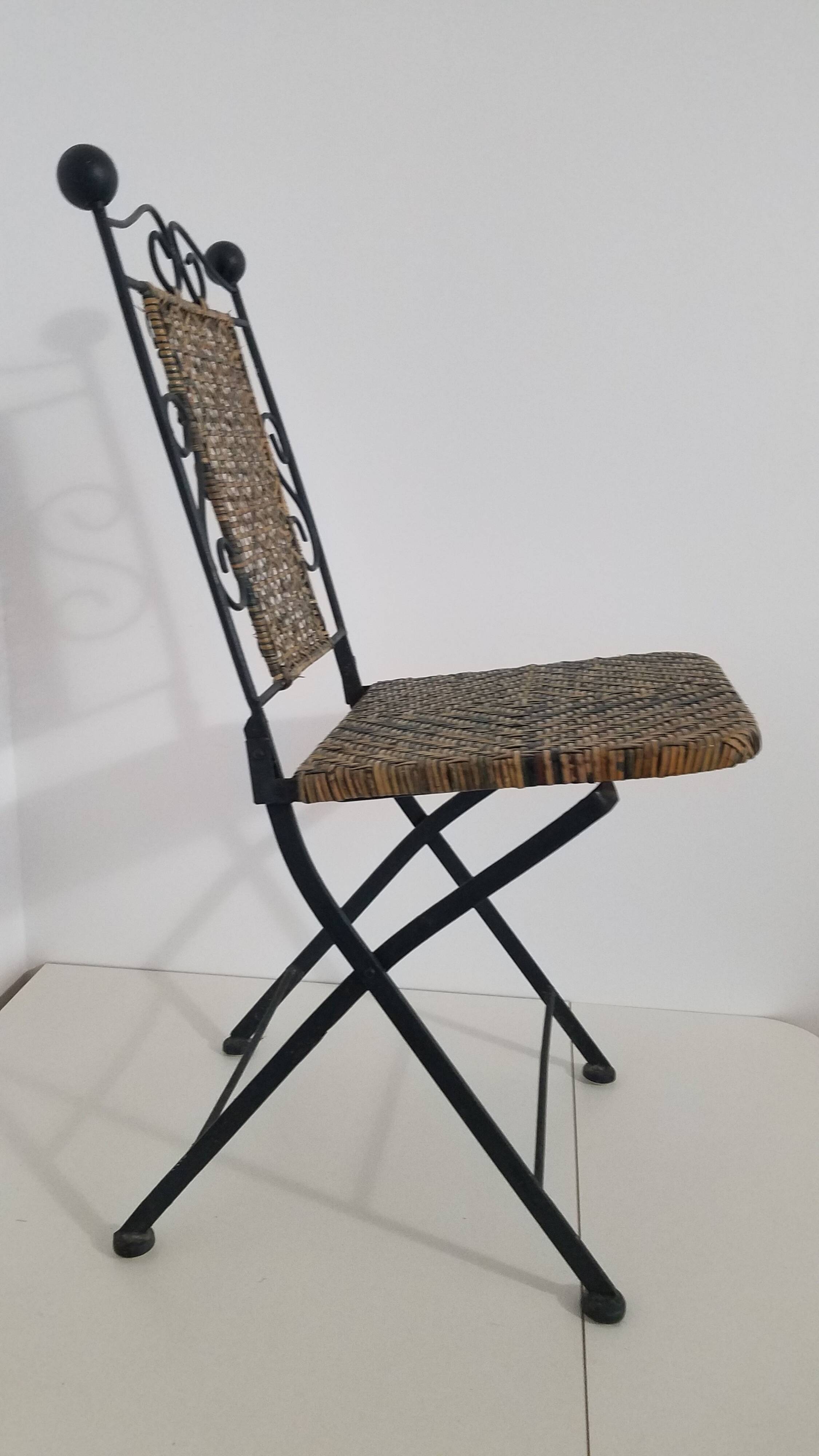 Chaise en fer forgé et rotin,  pliante  et vintage
