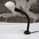 Articulated cream lamp with black plastic arm
