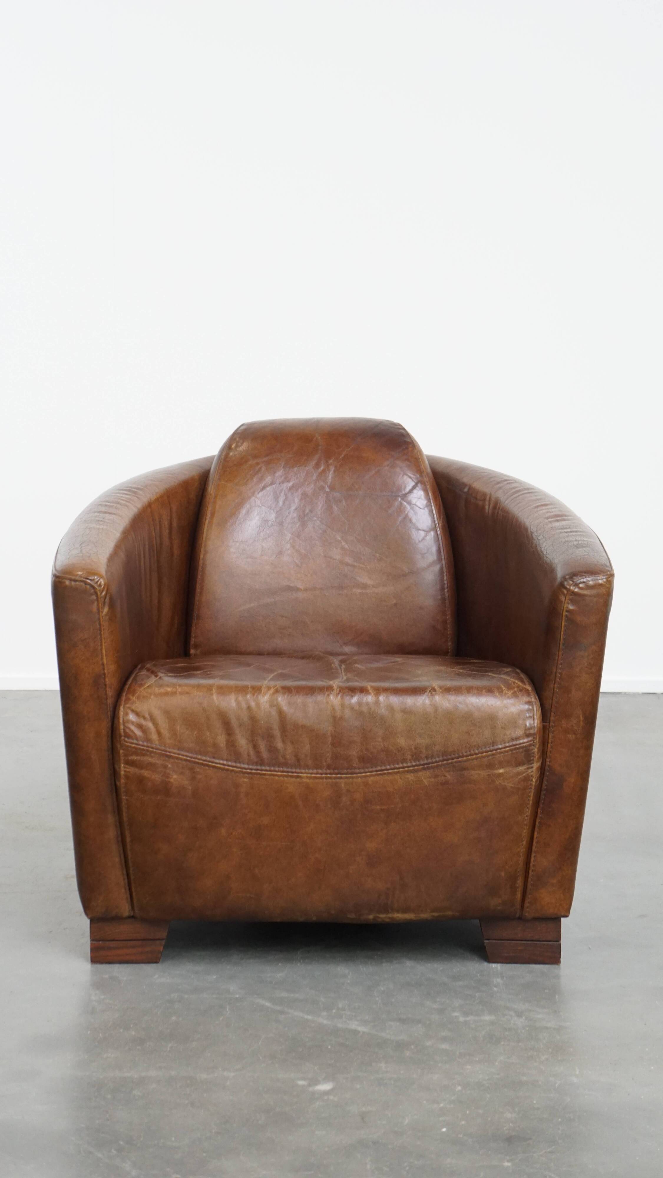 Brown Aviator design armchair made of cowhide leather